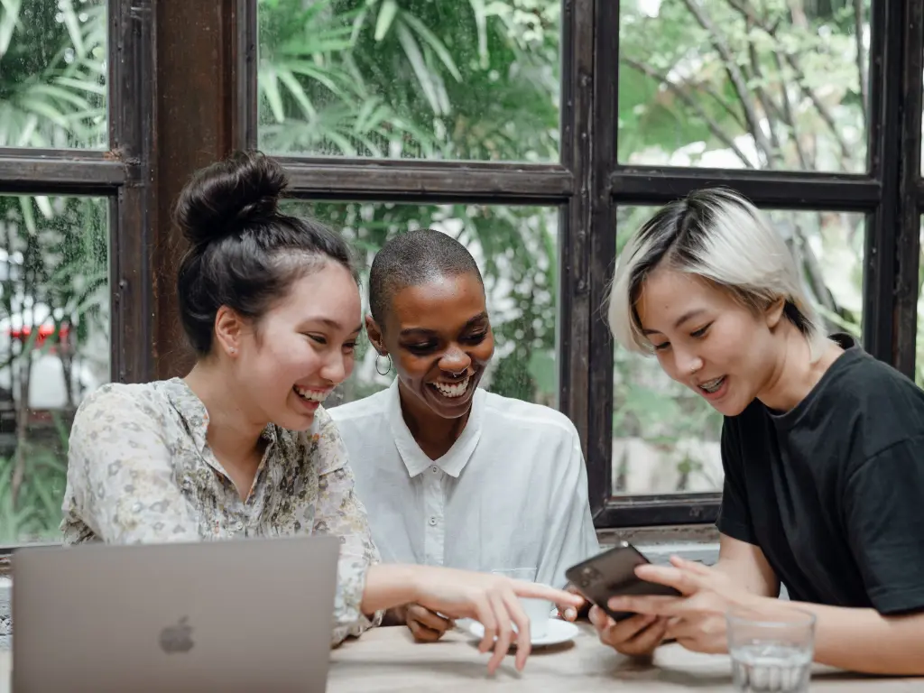 Women laughing about the funny email