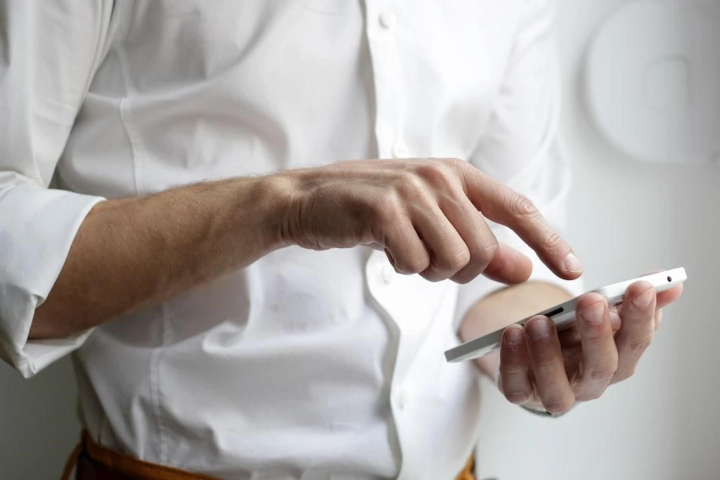 A man using a mobile phone