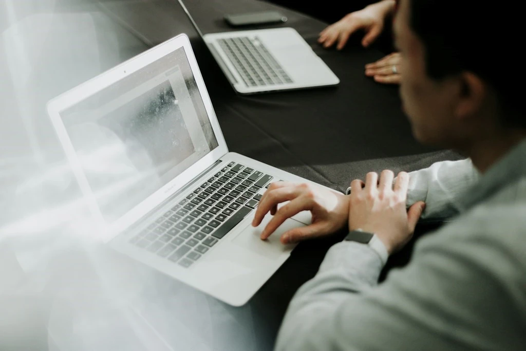 A man using his laptop