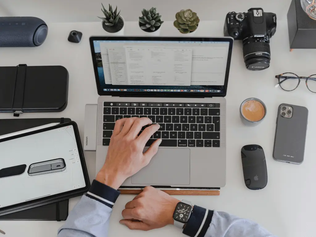 A man using his laptop.