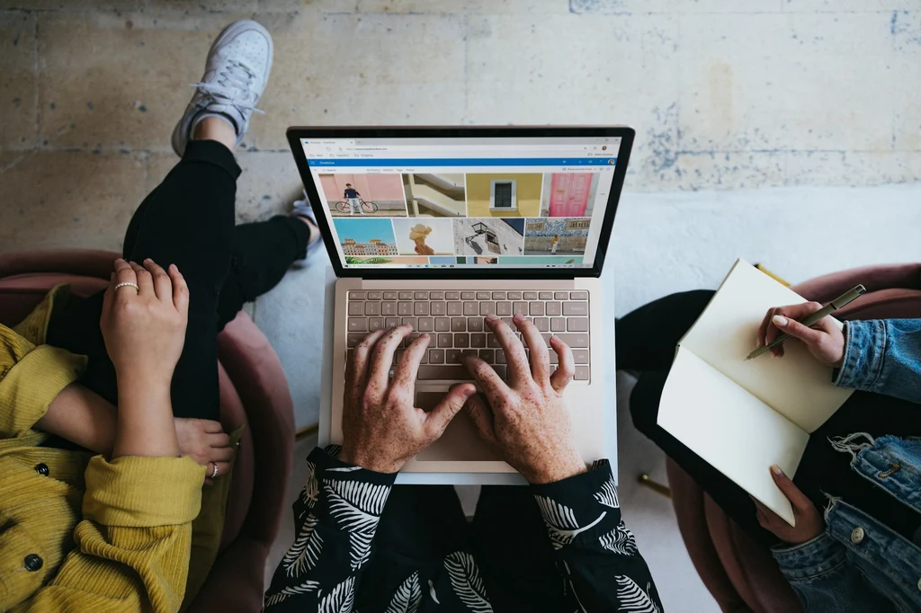Person working on laptop.